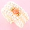 Bague réglable or et perles et agate rose.