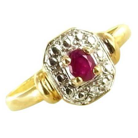 Jolie bague bicolore avec rubis