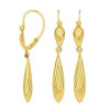 Boucles d'oreilles en or avec massettes